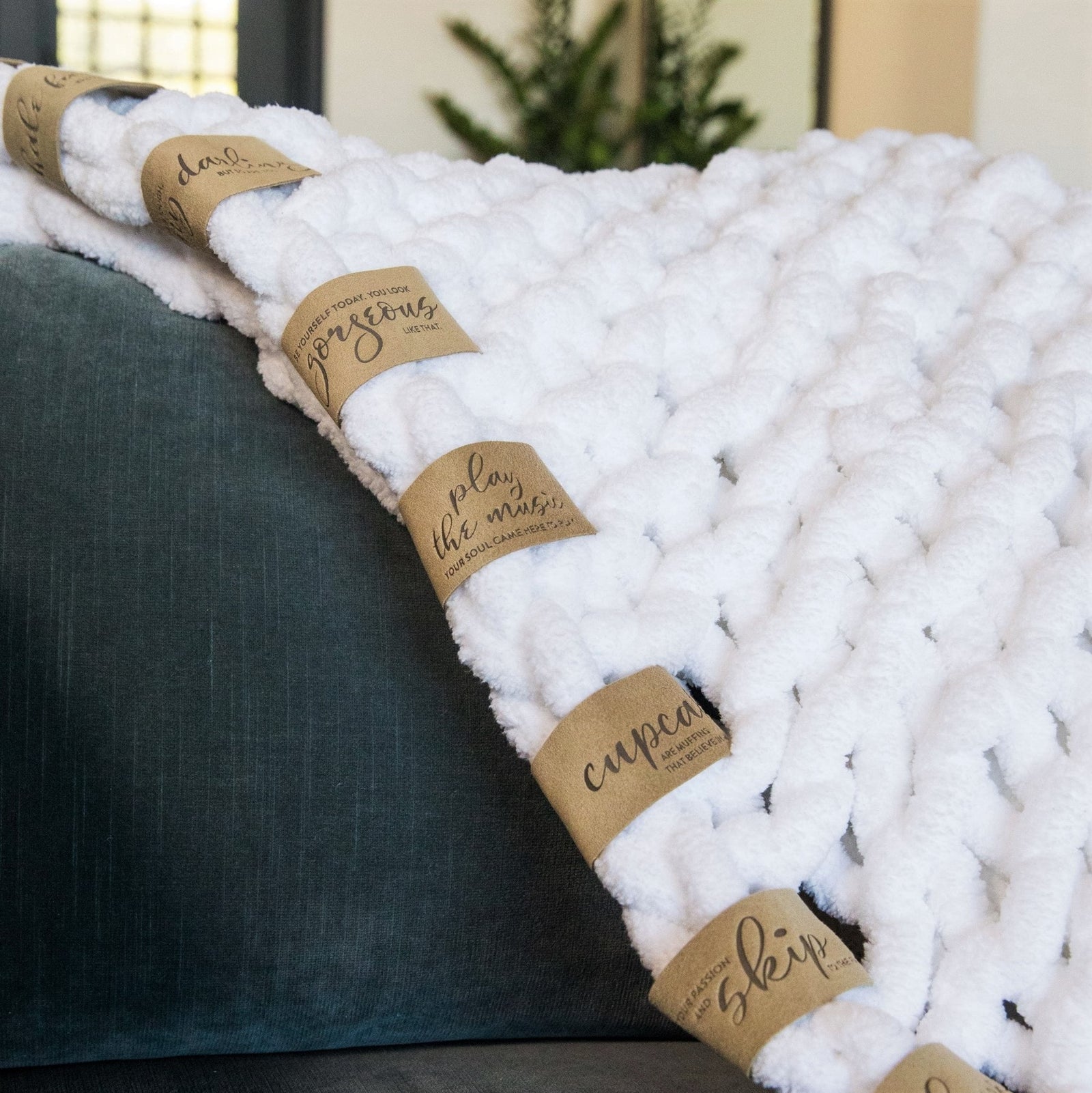 Multiple LoveSnaps attached on Infinite Lovie in White, soft and pliable Ultrasuede