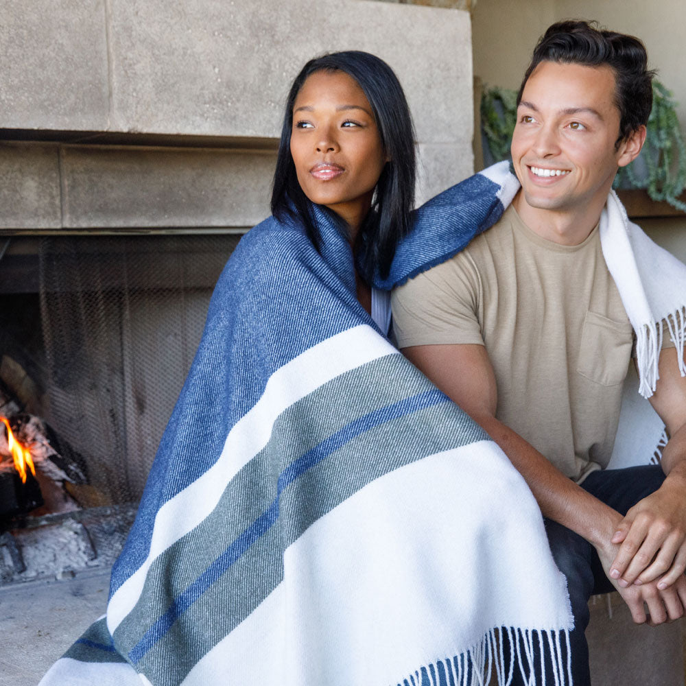 Couple wrapped with BIG LOViE Peace Mother Earth 100 percent lambswool blanket