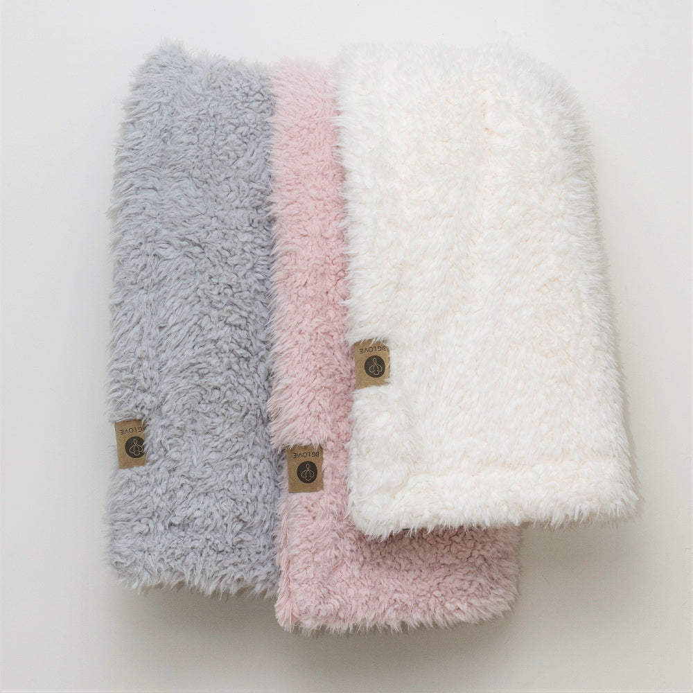 Stacked blankets with llama fabric  from the  Guardian Angel Collection in: Silver Cloud, Dusty Pink, and Whisper White