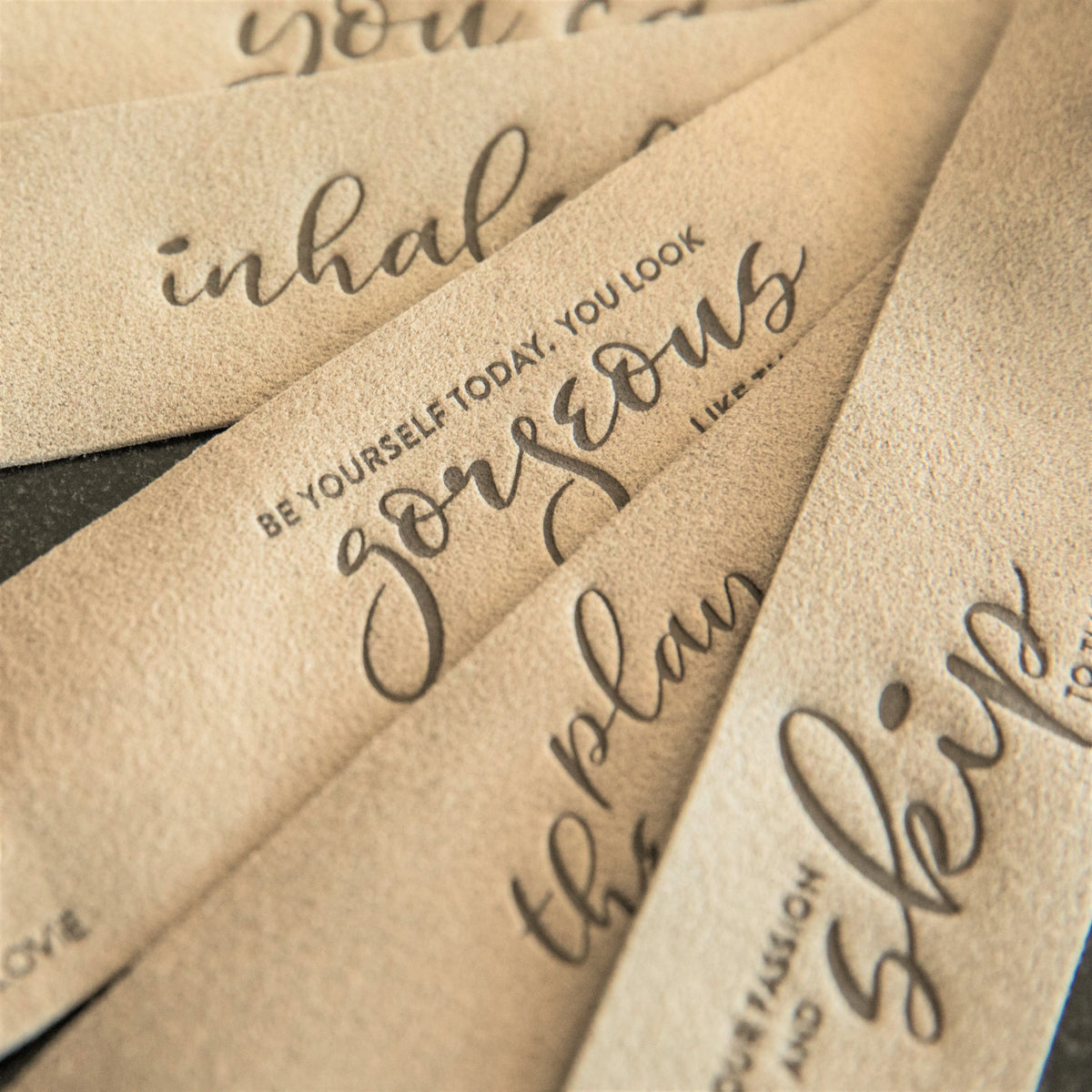 LoveSnaps fanned on table, soft and pliable Ultrasuede