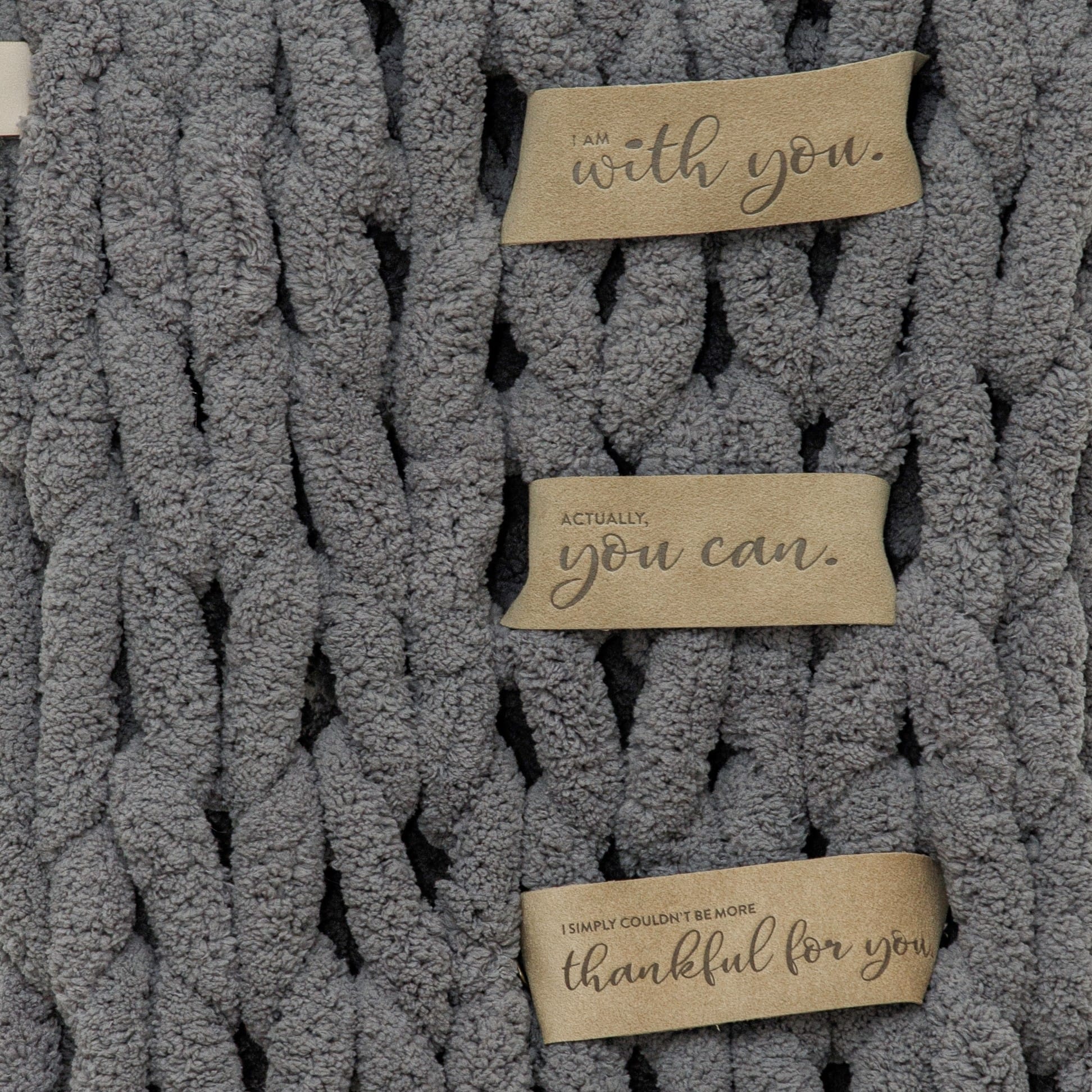 Close up of LoveSnaps on Big Infinite Lovie in Slate, soft and pliable Ultrasuede